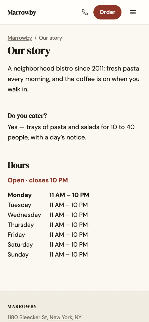 A page of the business’s own, “Our story”, on a phone, with text, a question and the opening hours